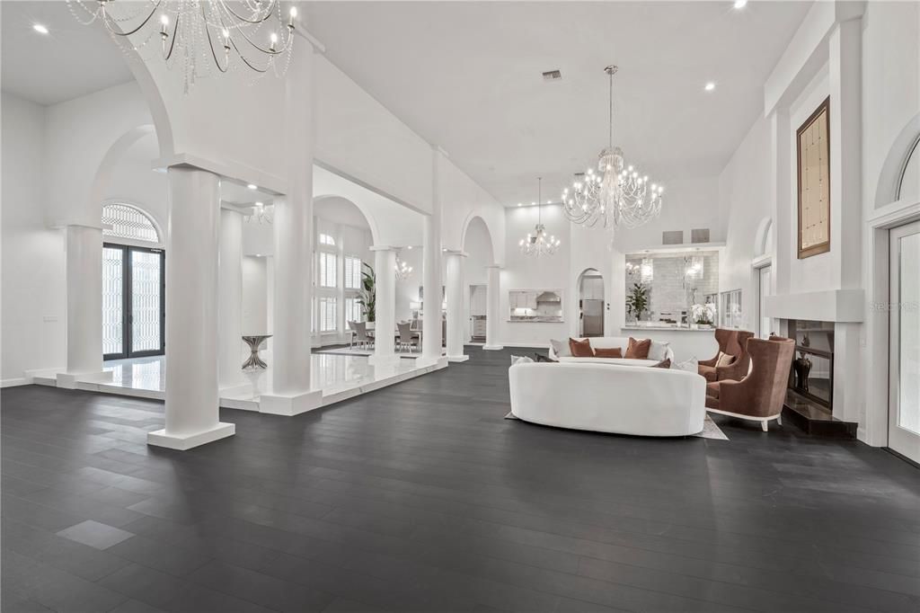 Chandelier, Fireplace, Interior, Living room, Recessed Lighting, Wood Texture Flooring