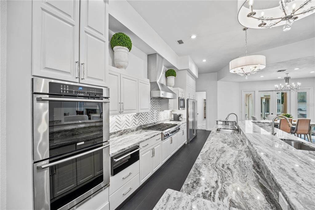 Chandelier, Interior, Kitchen, Pendant Lights, Recessed Lighting, Stainless Steel Appliances, Wood Texture Flooring