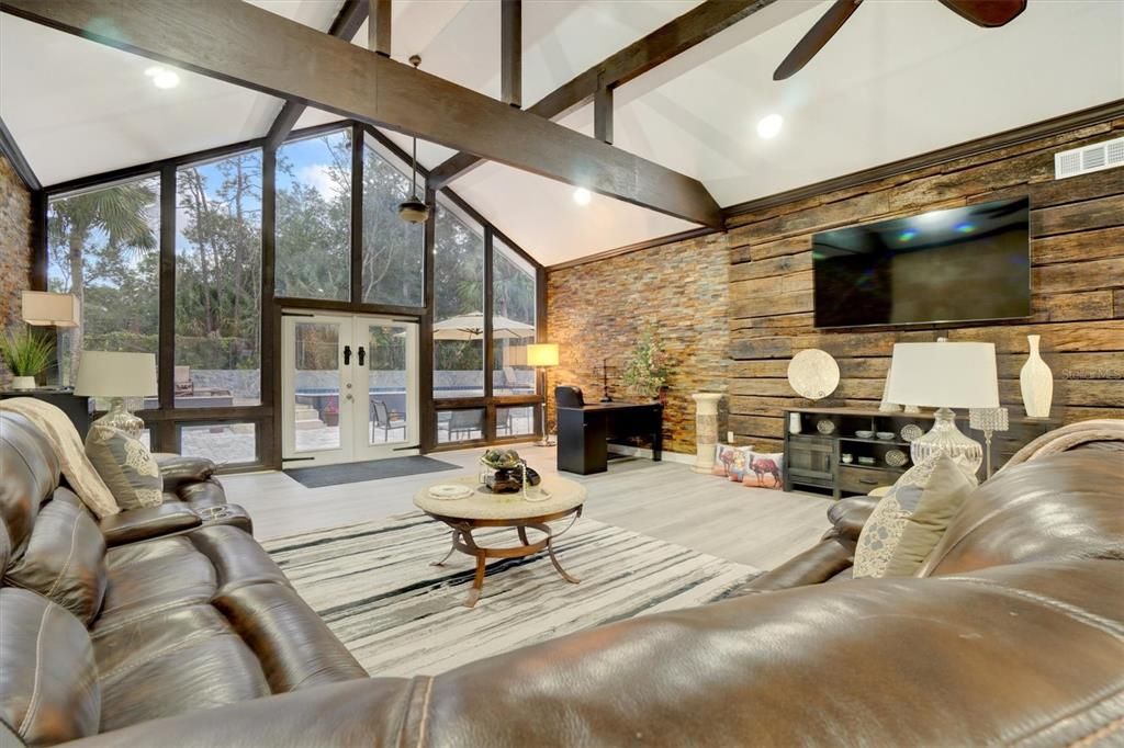 Fireplace, Interior, Living room, Recessed Lighting, Stone Walls, Wood Texture Flooring