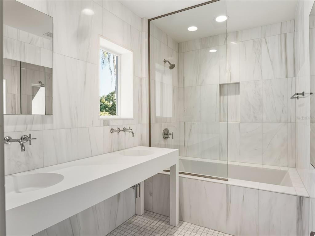 Bathroom, Dual Sink Vanities, Glass Shower, Interior, Marble Walls, Recessed Lighting