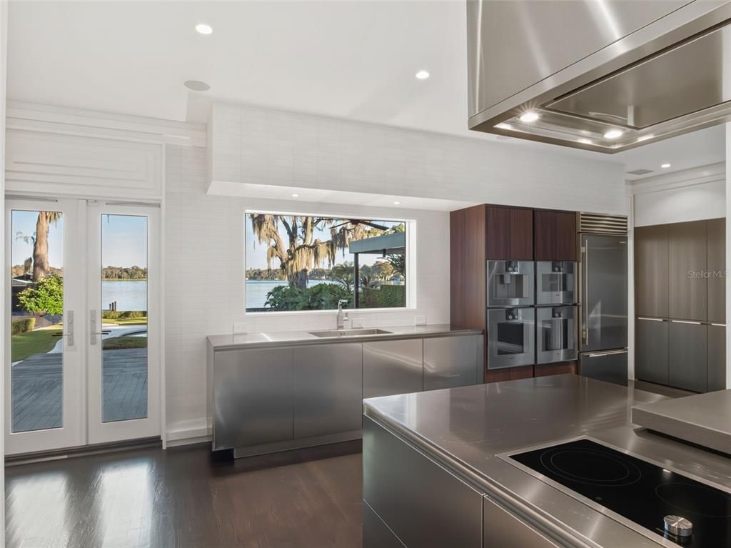 Interior, Kitchen, Recessed Lighting, Stainless Steel Appliances, Water, Wood Texture Flooring