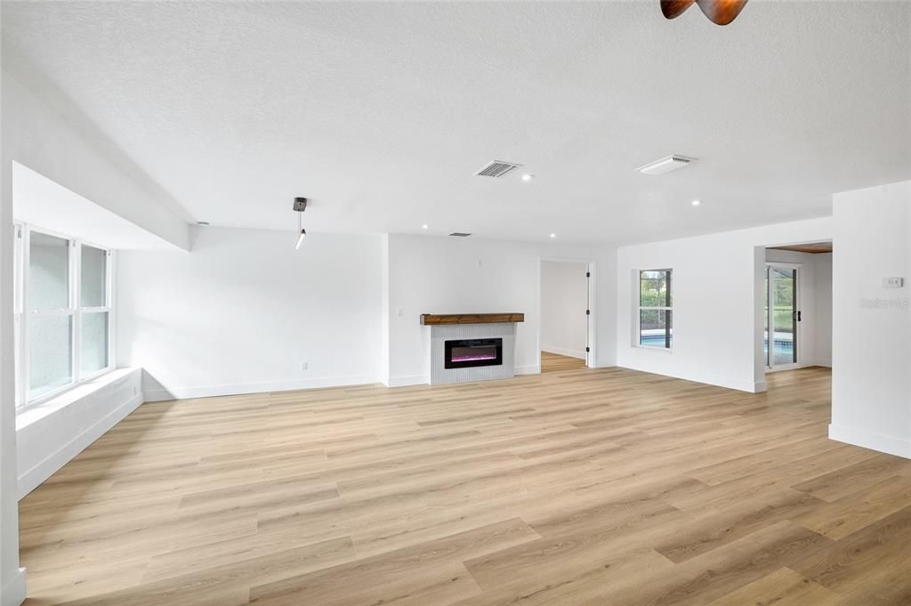 Empty room, Fireplace, Interior, Recessed Lighting, Wood Texture Flooring