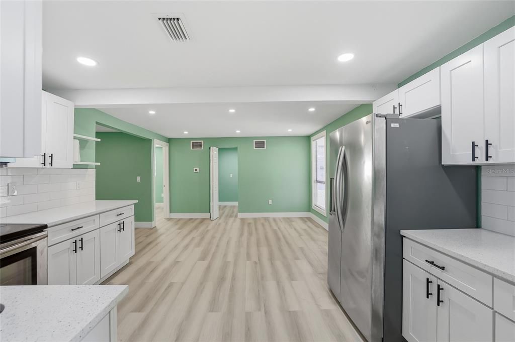 Interior, Kitchen, Recessed Lighting, Stainless Steel Appliances, Wood Texture Flooring