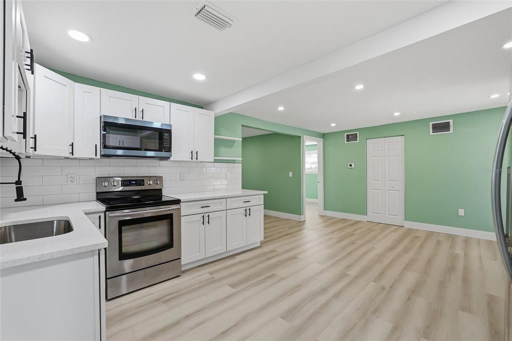 Interior, Kitchen, Recessed Lighting, Stainless Steel Appliances, Wood Texture Flooring