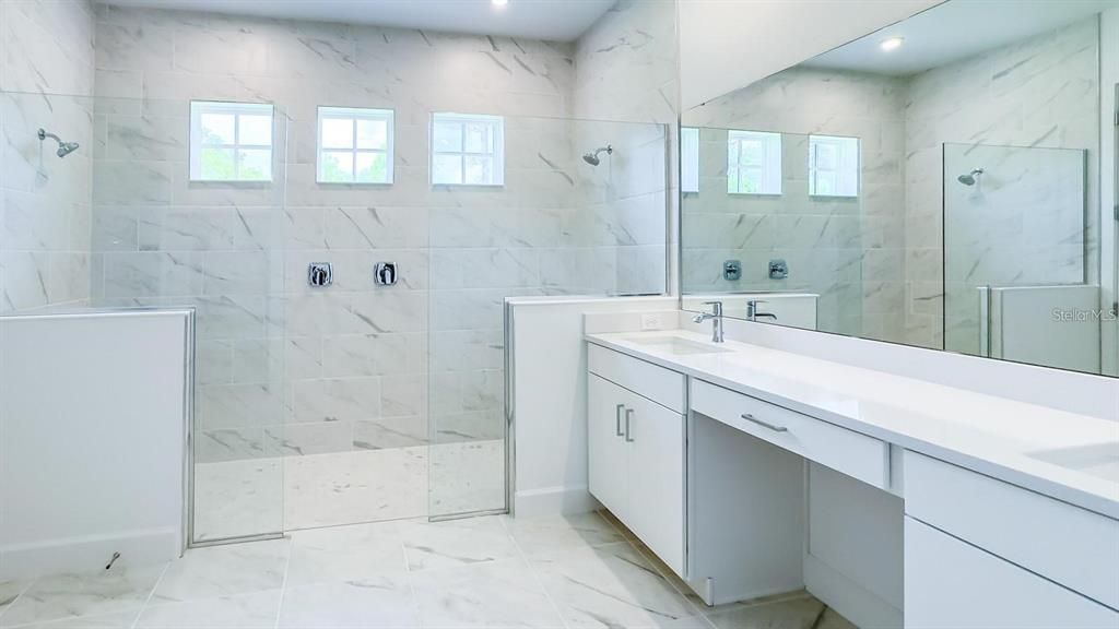 Bathroom, Dual Sink Vanities, Glass Shower, Interior, Marble, Marble Walls, Recessed Lighting