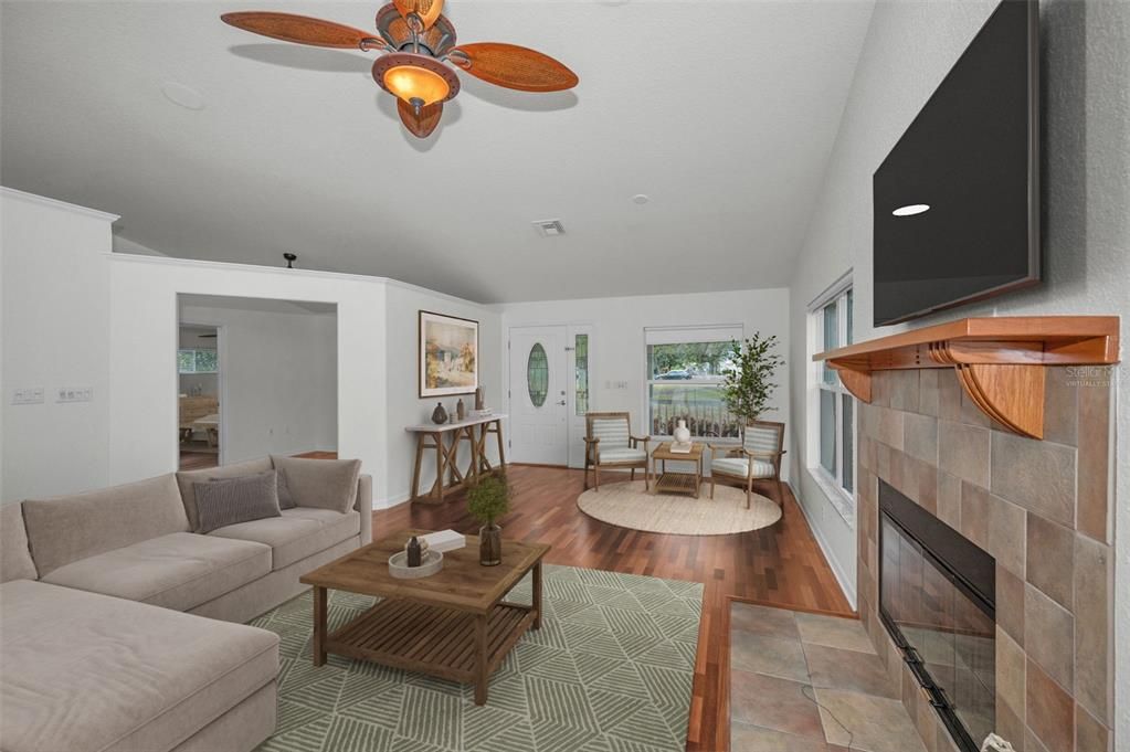 Dining room, Fireplace, Interior, Living room, Recessed Lighting, Wood Texture Flooring