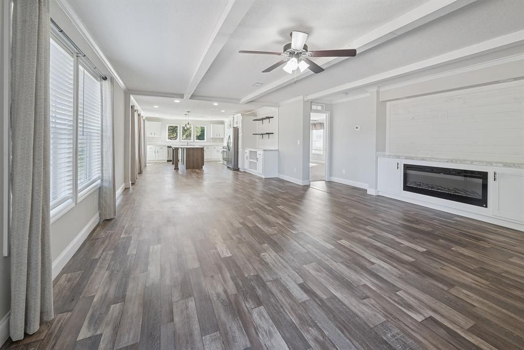 Empty room, Fireplace, Interior, Recessed Lighting, Wood Texture Flooring