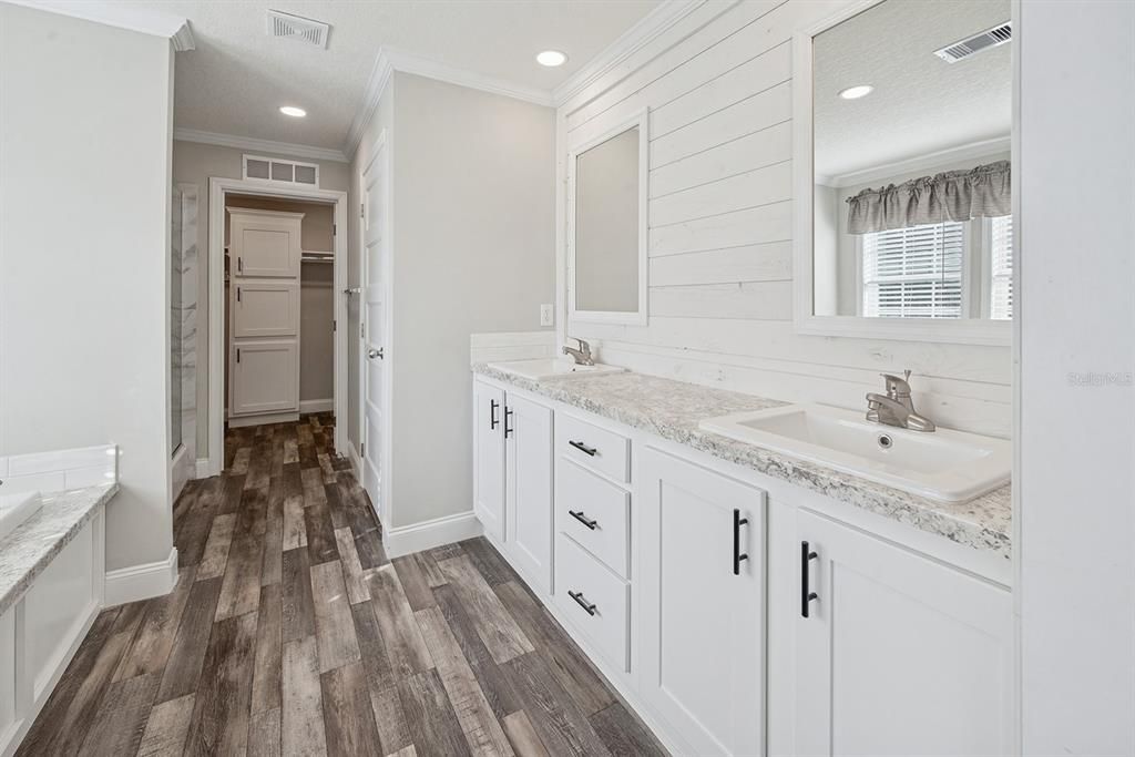 Bathroom, Dual Sink Vanities, Interior, Recessed Lighting, Walk-in Closets, Wood Texture Flooring