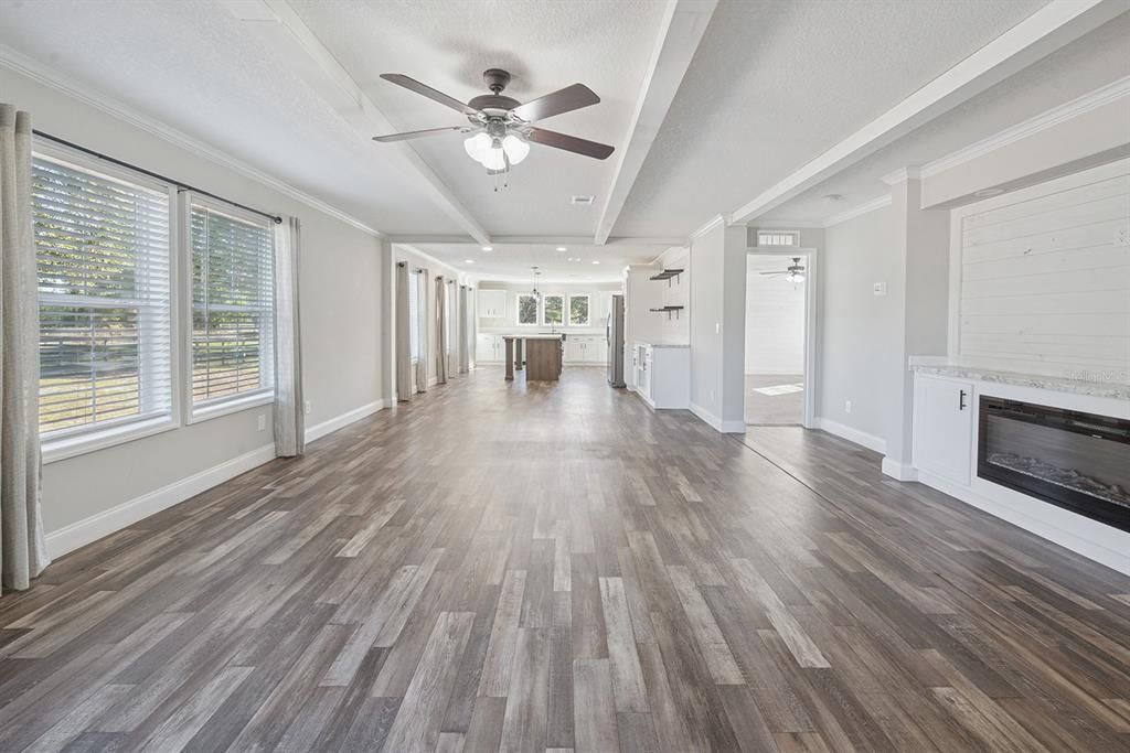 Empty room, Fireplace, Interior, Recessed Lighting, Wood Texture Flooring