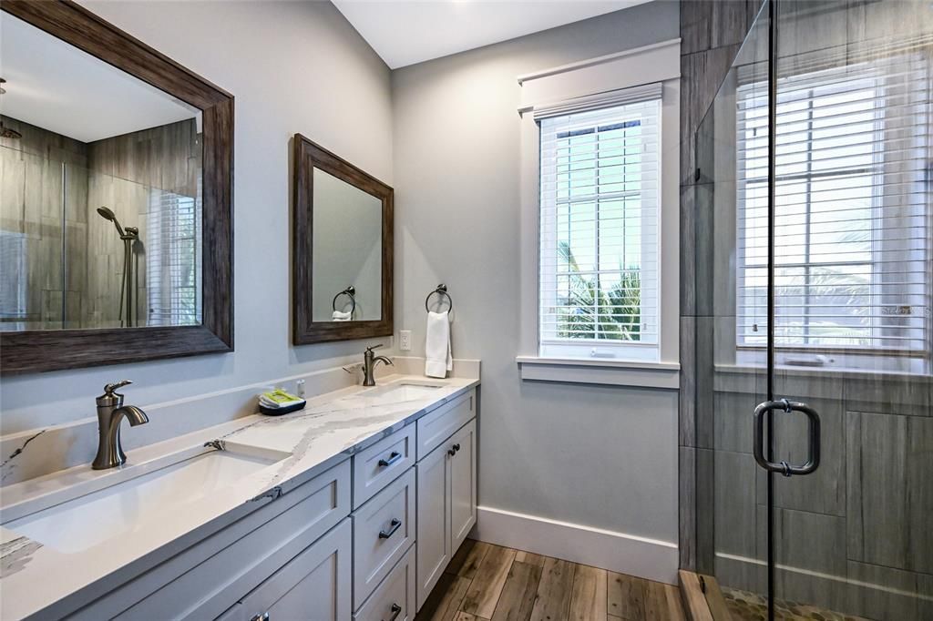 Bathroom, Dual Sink Vanities, Glass Shower, Interior, Wood Texture Flooring