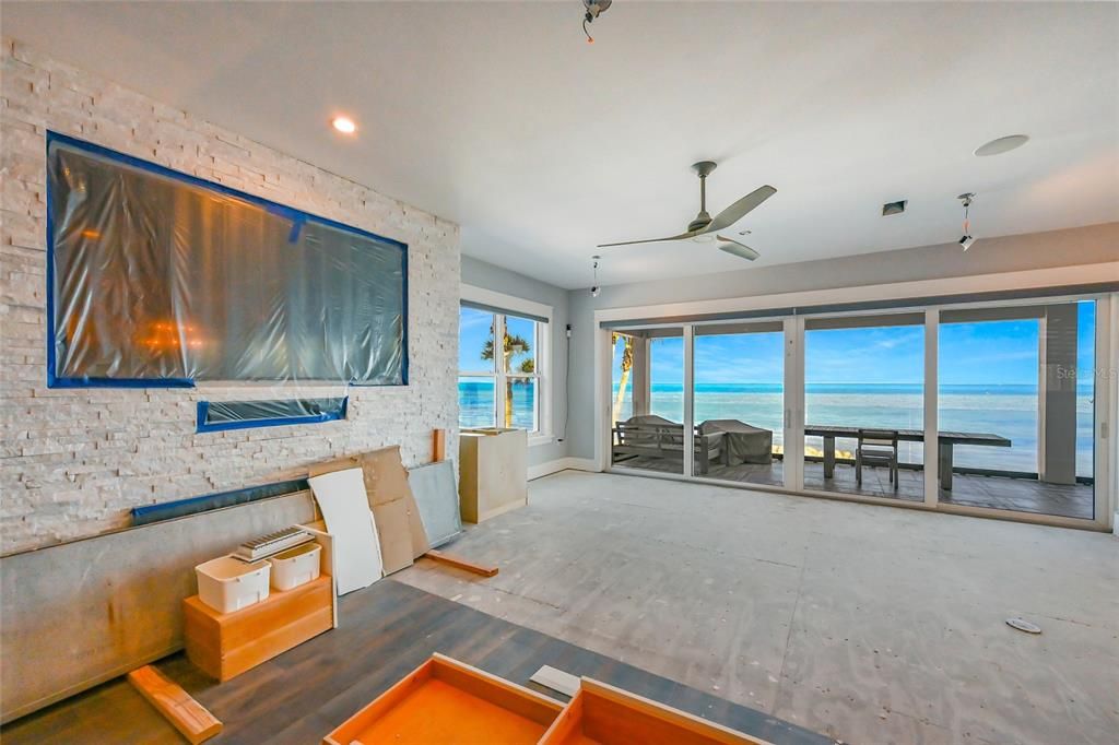 Empty room, Fireplace, Interior, Recessed Lighting, Stone Walls, Water