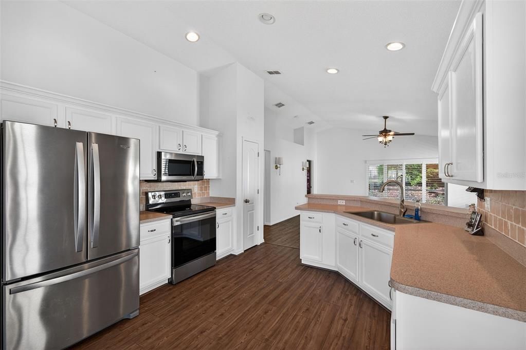 Interior, Kitchen, Recessed Lighting, Stainless Steel Appliances, Wood Texture Flooring