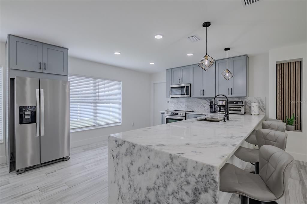 Interior, Kitchen, Pendant Lights, Recessed Lighting, Stainless Steel Appliances, Wood Texture Flooring