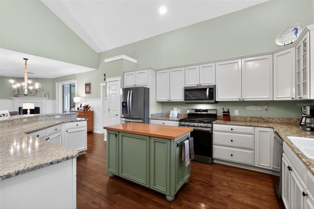 Chandelier, Interior, Kitchen, Pendant Lights, Recessed Lighting, Stainless Steel Appliances, Wood Texture Flooring