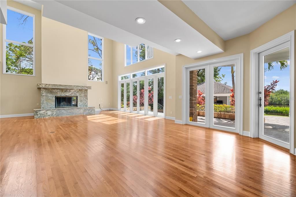 Empty room, Fireplace, Interior, Recessed Lighting, Wood Texture Flooring