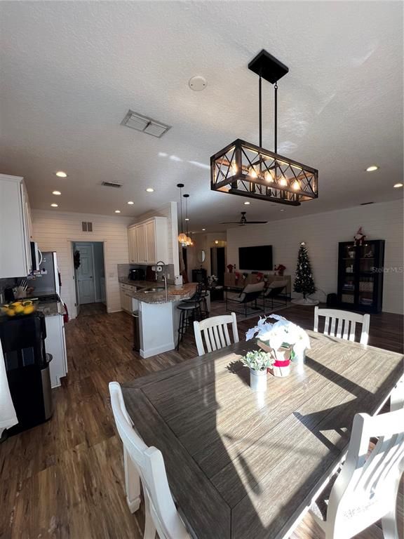 Chandelier, Dining room, Interior, Kitchen, Living room, Pendant Lights, Recessed Lighting, Wood Texture Flooring