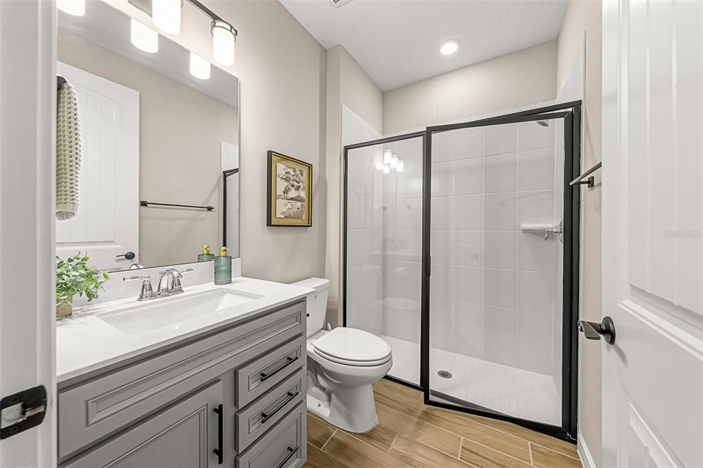 Bathroom, Glass Shower, Interior, Recessed Lighting, Wood Texture Flooring