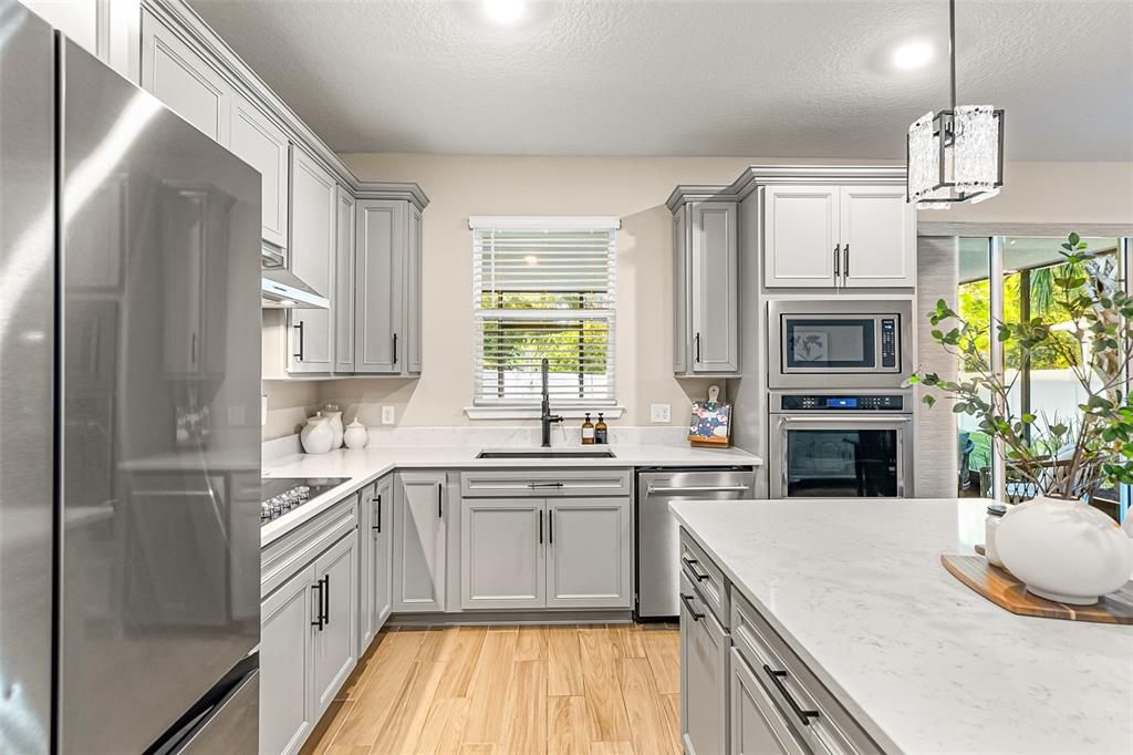 Interior, Kitchen, Pendant Lights, Recessed Lighting, Stainless Steel Appliances, Wood Texture Flooring