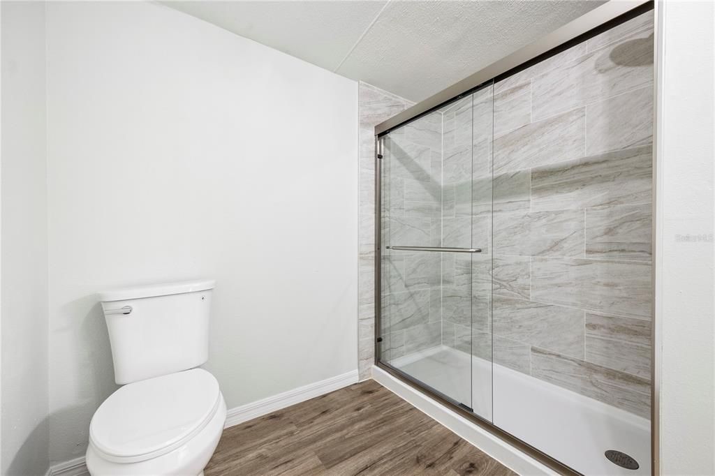 Bathroom, Glass Shower, Interior, Wood Texture Flooring