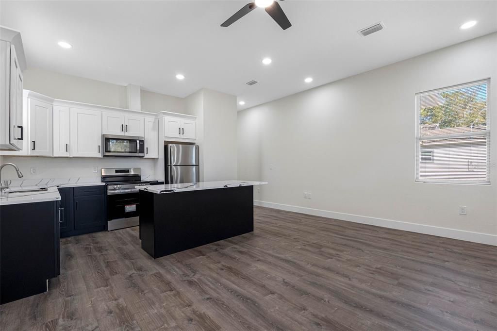 Interior, Kitchen, Recessed Lighting, Stainless Steel Appliances, Wood Texture Flooring