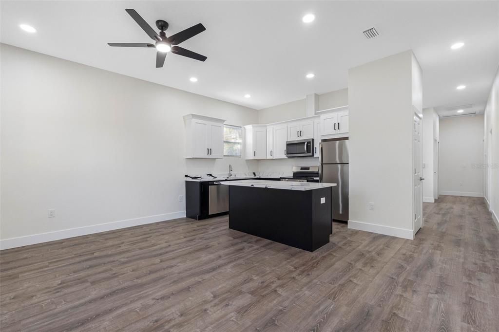 Interior, Kitchen, Recessed Lighting, Stainless Steel Appliances, Wood Texture Flooring