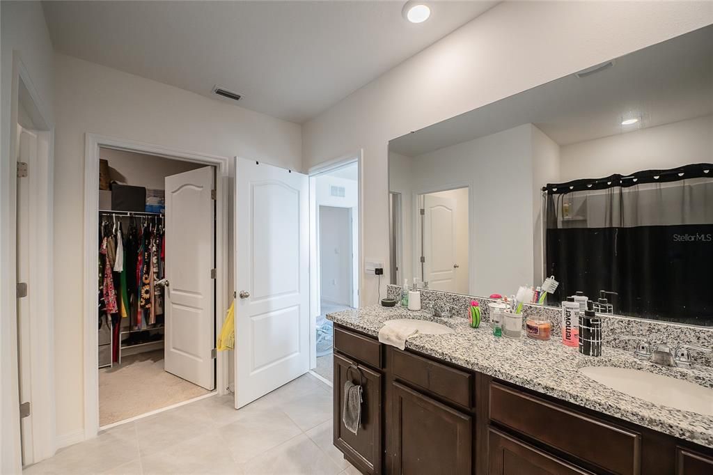 Bathroom, Dual Sink Vanities, Interior, Recessed Lighting, Walk-in Closets