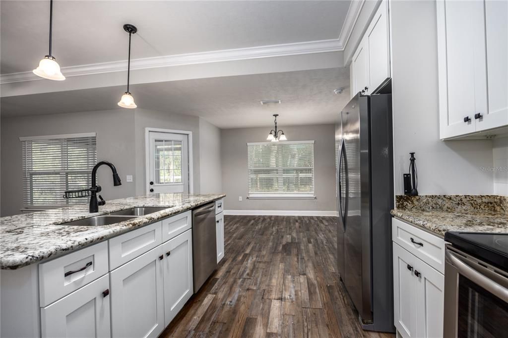 Interior, Kitchen, Pendant Lights, Stainless Steel Appliances, Wood Texture Flooring