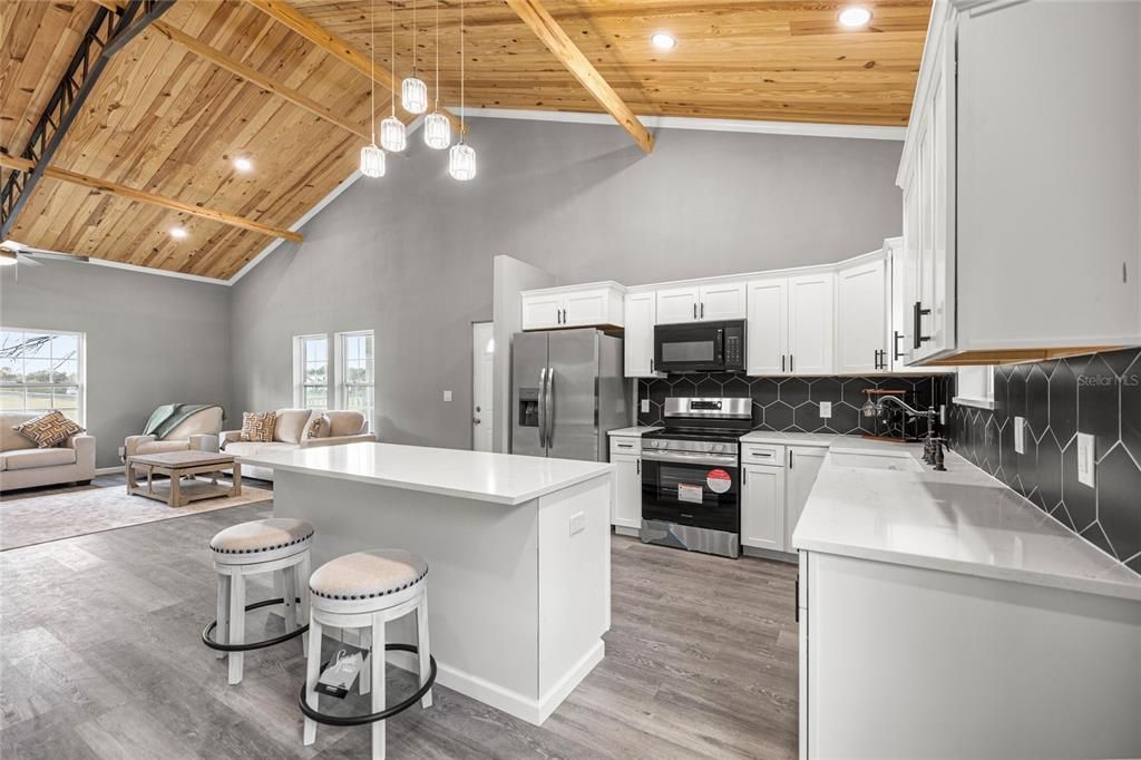 Interior, Kitchen, Living room, Pendant Lights, Recessed Lighting, Stainless Steel Appliances, Wooden Beams, Wooden Ceilings, Wood Texture Flooring