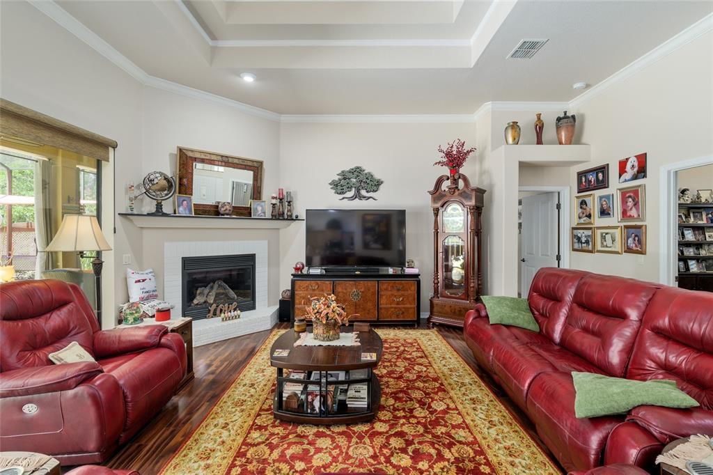 Fireplace, Interior, Living room, Recessed Lighting, Wood Texture Flooring