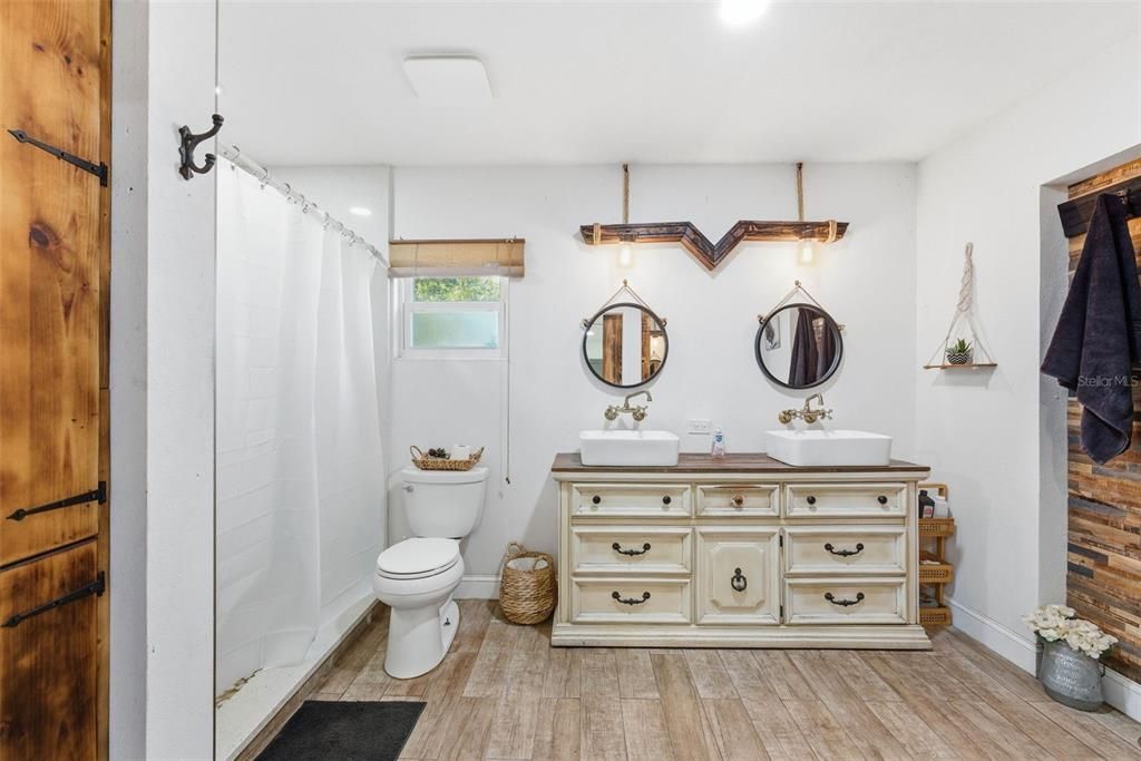 Bathroom, Dual Sink Vanities, Interior, Recessed Lighting, Wood Texture Flooring