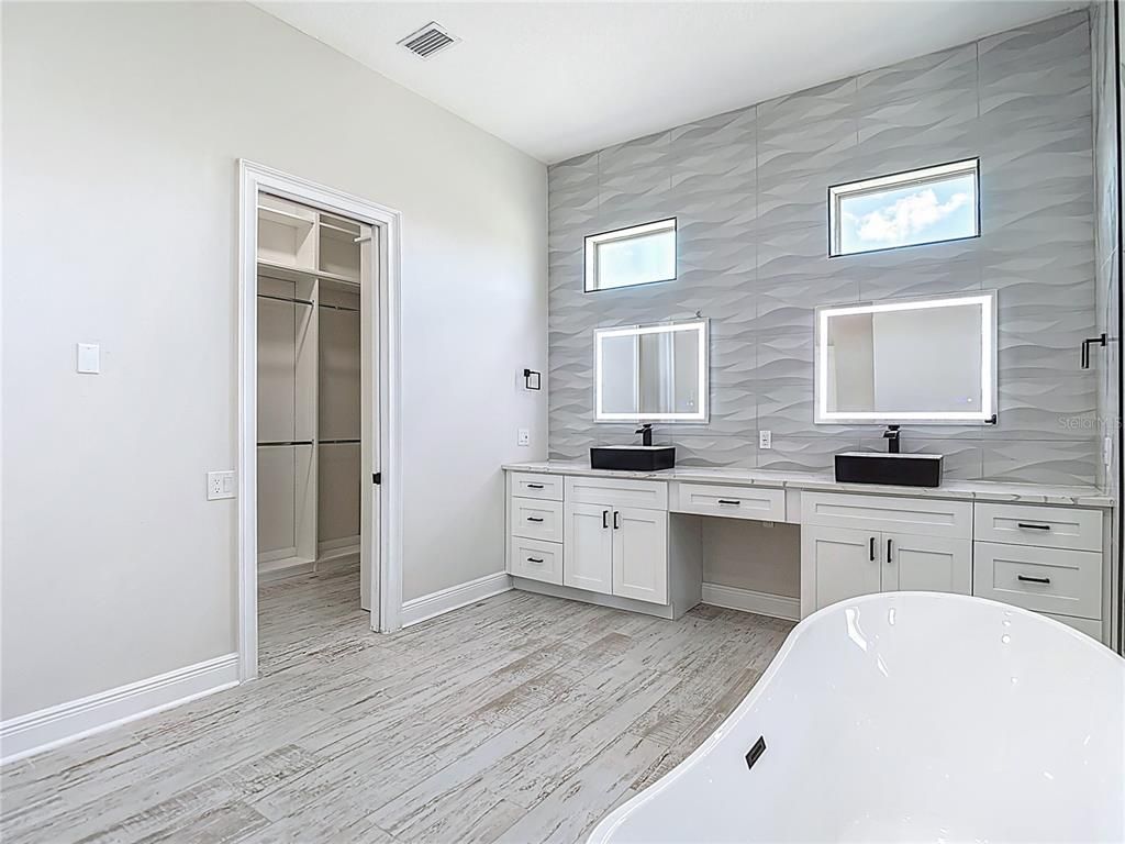 Bathroom, Dual Sink Vanities, Free Standing Baths, Interior, Wood Texture Flooring