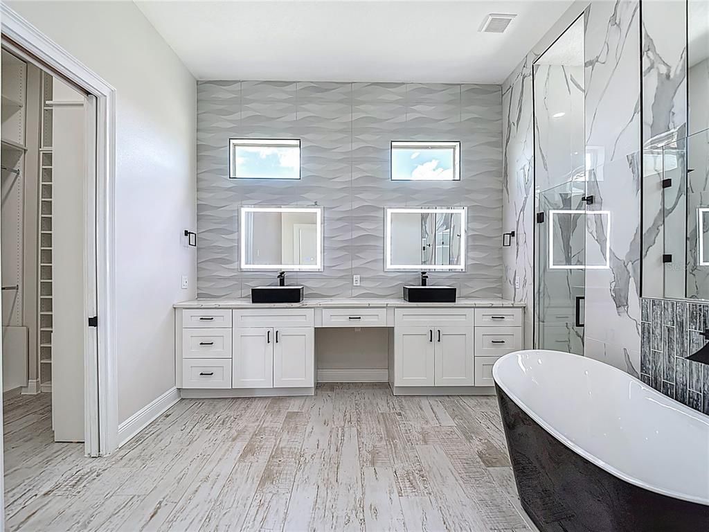 Bathroom, Dual Sink Vanities, Free Standing Baths, Interior, Wood Texture Flooring