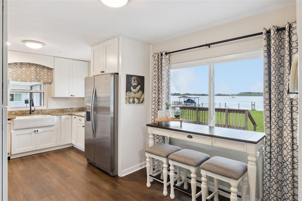 Interior, Kitchen, Recessed Lighting, Stainless Steel Appliances, Water, Wood Texture Flooring