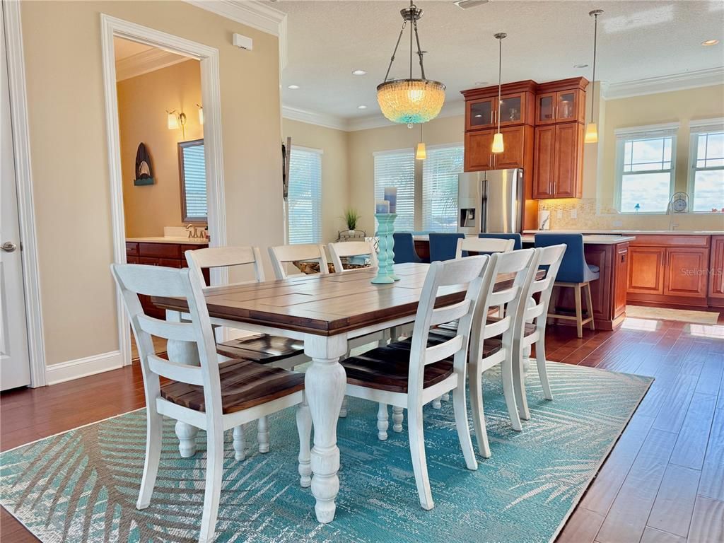 Dining room, Interior, Kitchen, Pendant Lights, Recessed Lighting, Stainless Steel Appliances, Wood Texture Flooring