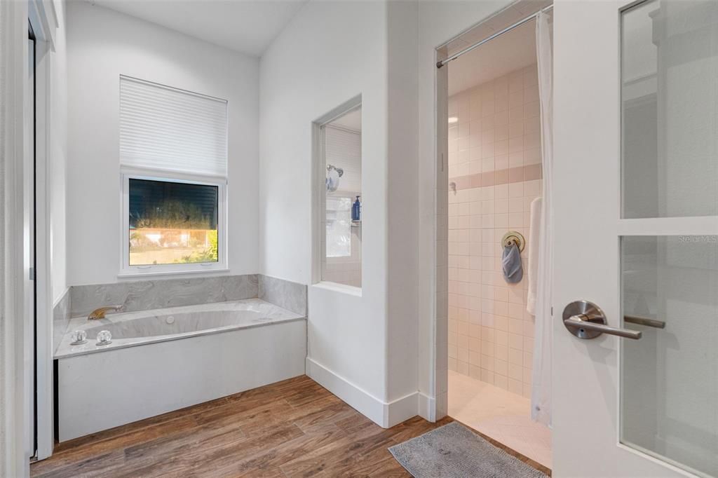 Bathroom, Fireplace, Glass Shower, Interior, Wood Texture Flooring