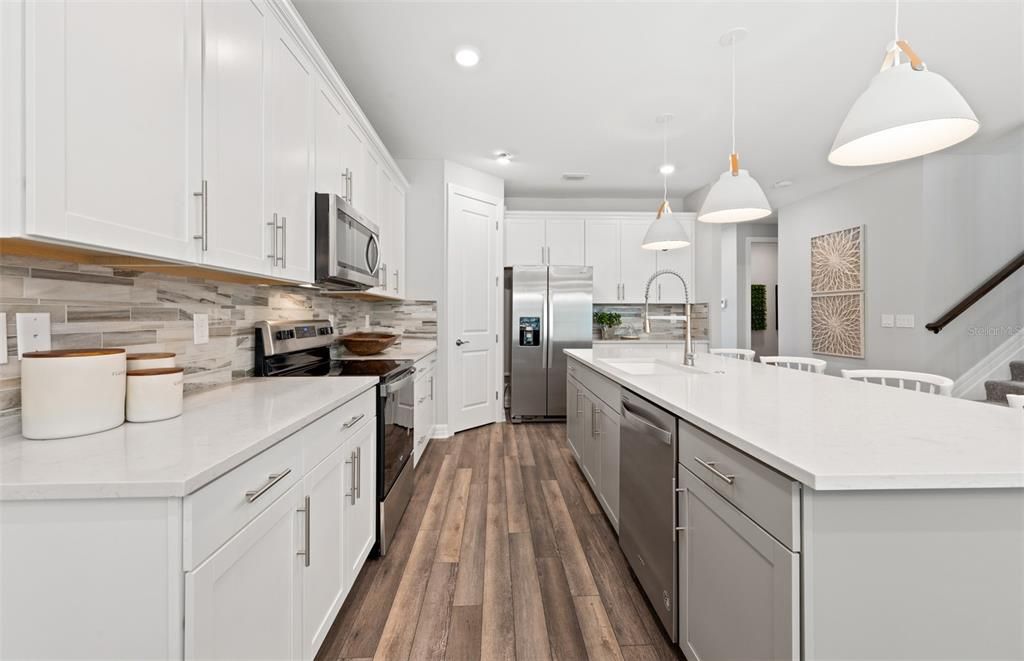 Interior, Kitchen, Pendant Lights, Recessed Lighting, Stainless Steel Appliances, Wood Texture Flooring