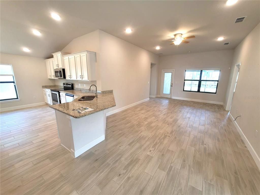 Empty room, Interior, Kitchen, Recessed Lighting, Wood Texture Flooring