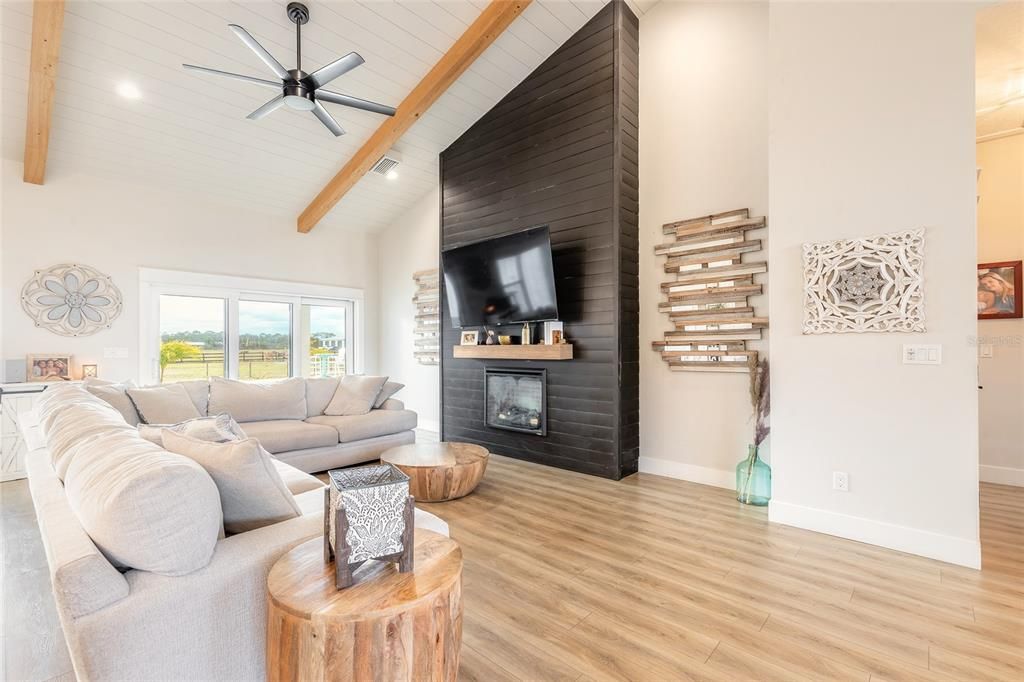 Fireplace, Interior, Living room, Recessed Lighting, Wooden Beams, Wood Texture Flooring