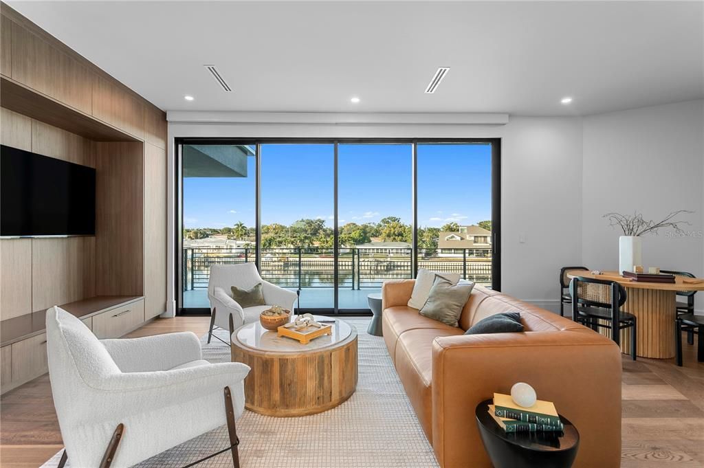 Dining room, Interior, Living room, Recessed Lighting, Water, Wood Texture Flooring