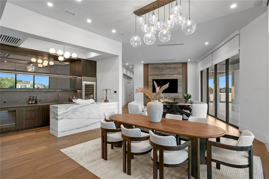 Dining room, Interior, Kitchen, Pendant Lights, Recessed Lighting, Stainless Steel Appliances, Wood Texture Flooring