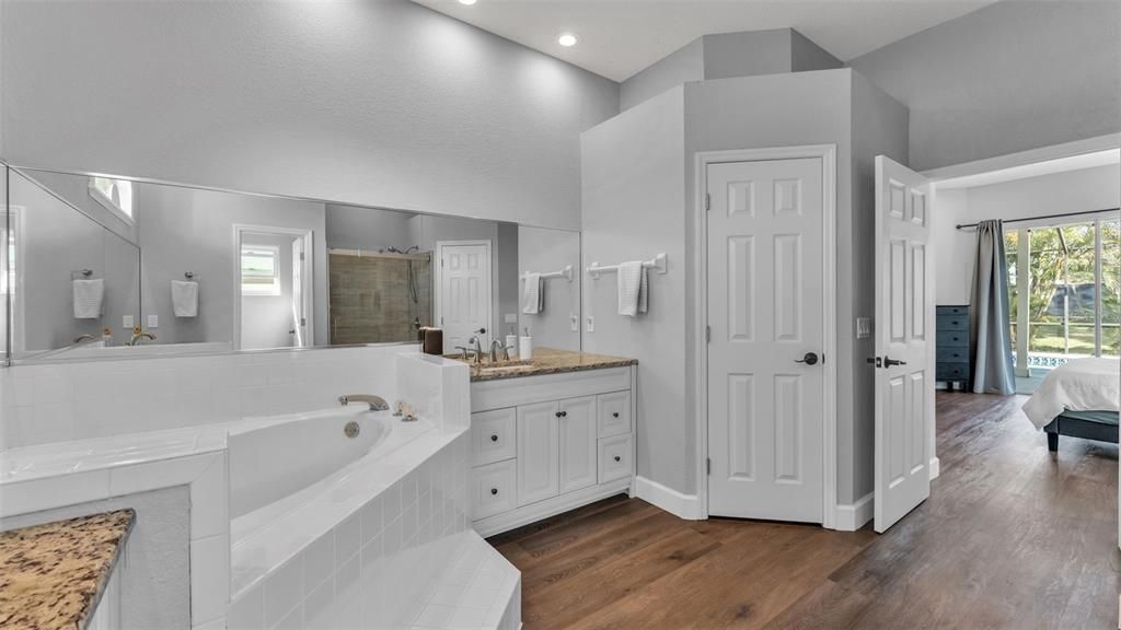 Bathroom, Dual Sink Vanities, Interior, Recessed Lighting, Wood Texture Flooring