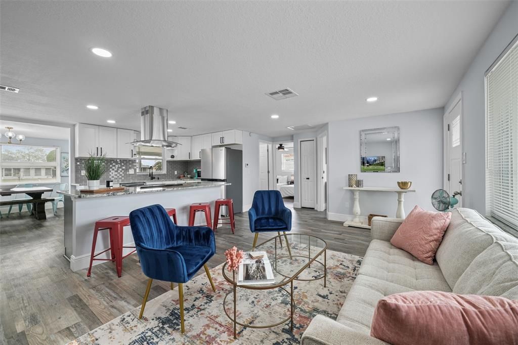 Dining room, Interior, Kitchen, Living room, Recessed Lighting, Stainless Steel Appliances, Wood Texture Flooring