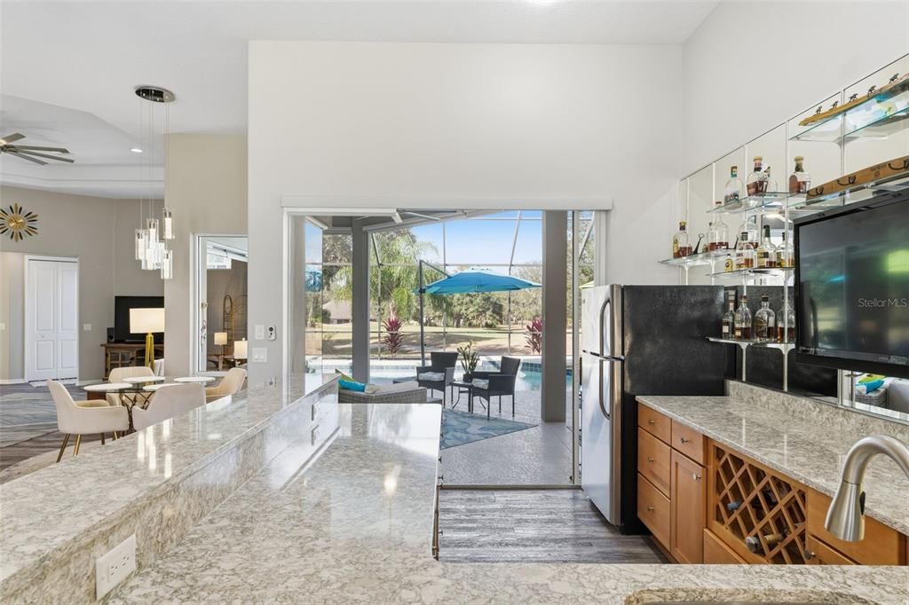 Dining room, Interior, Kitchen, Living room, Pendant Lights, Recessed Lighting, Wood Texture Flooring