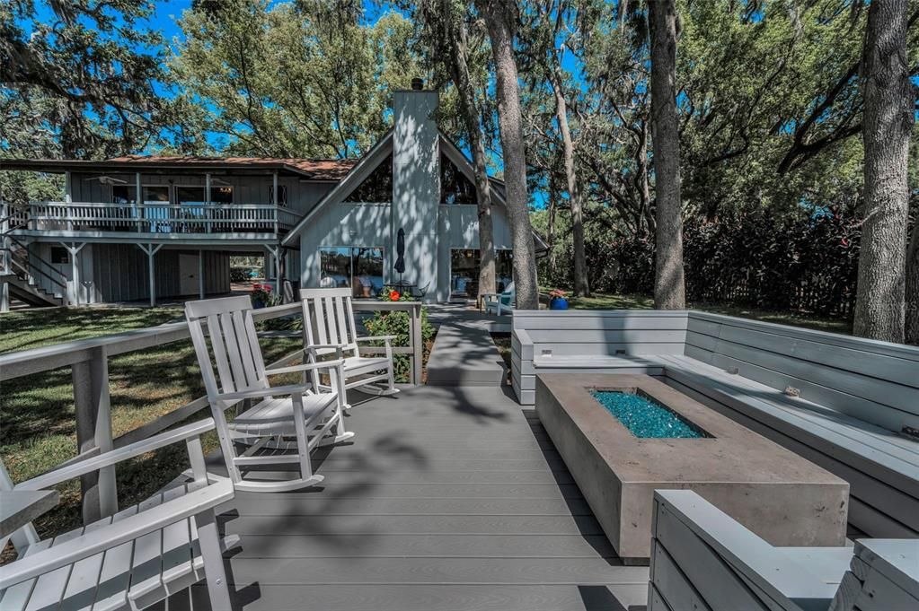 Chandelier, Dining room, Interior, Kitchen, Living room, Pendant Lights, Recessed Lighting, Stainless Steel Appliances, Wooden Ceilings, Wood Texture Flooring