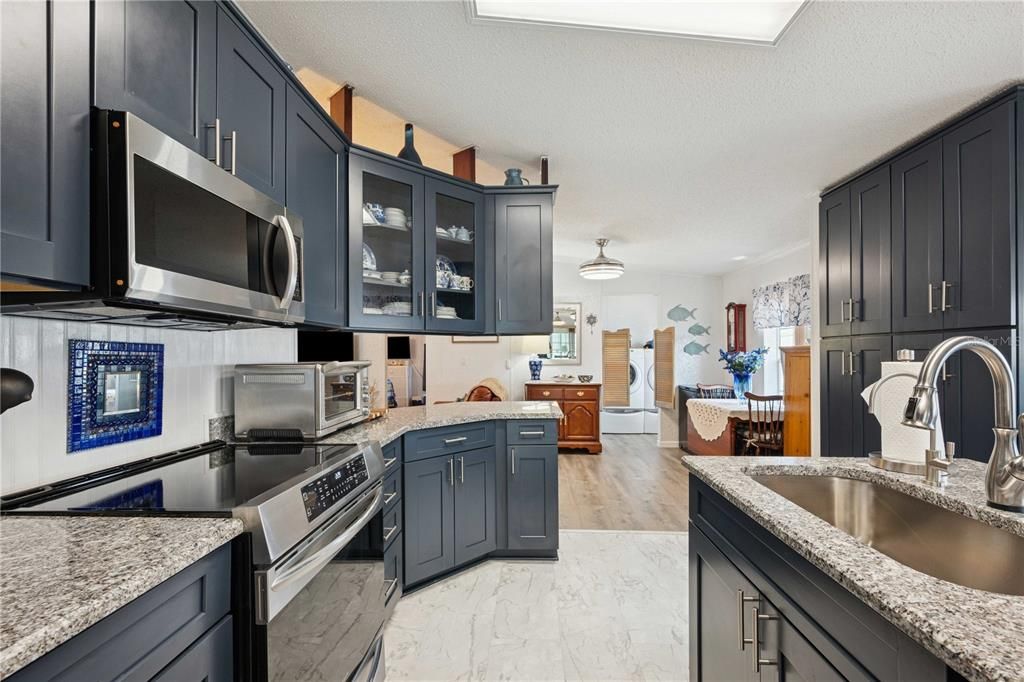 Interior, Kitchen, Marble, Pendant Lights, Stainless Steel Appliances, Wood Texture Flooring