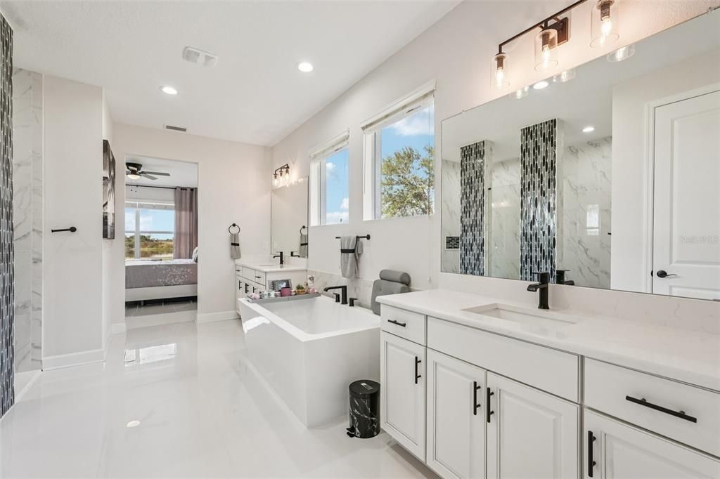 Bathroom, Dual Sink Vanities, Free Standing Baths, Interior, Marble, Marble Walls, Recessed Lighting