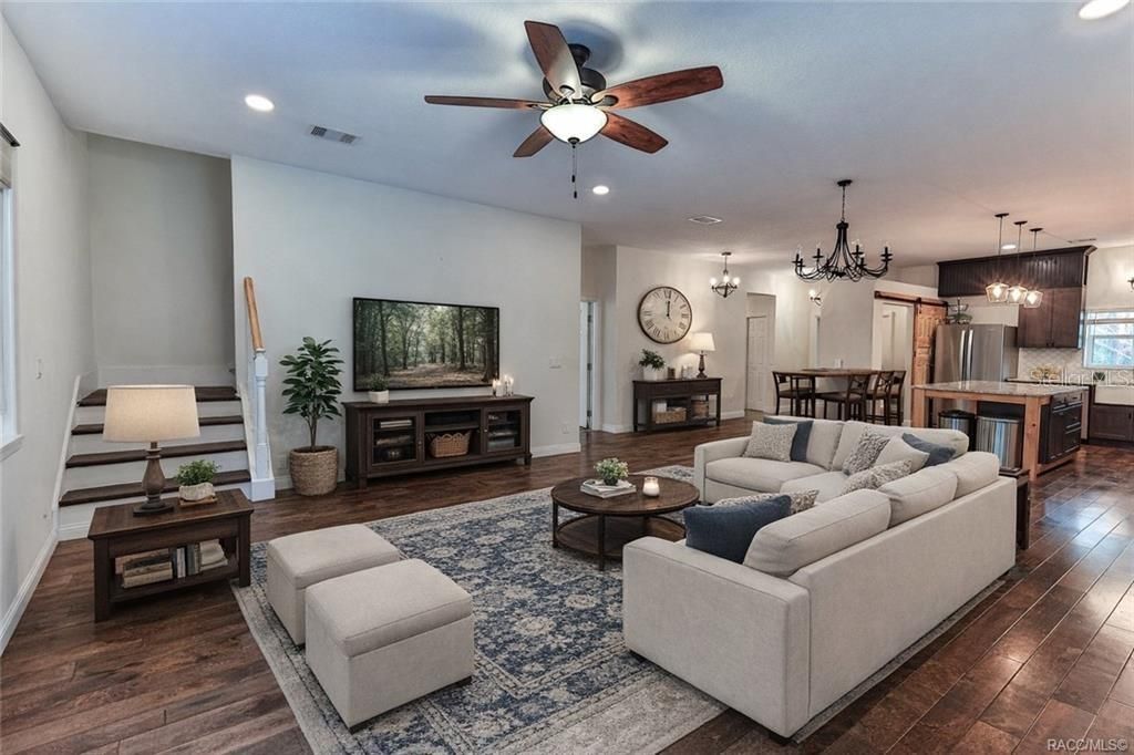 Dining room, Interior, Kitchen, Living room, Pendant Lights, Recessed Lighting, Stainless Steel Appliances, Wood Texture Flooring