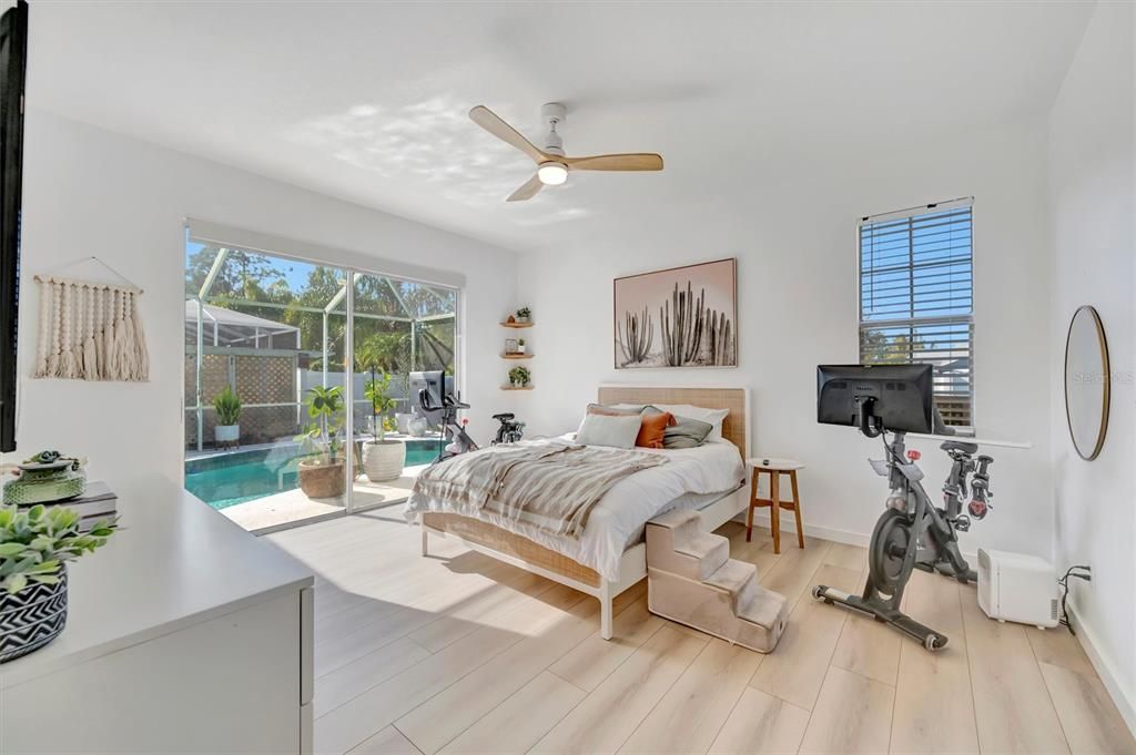 Bedroom, Fitness Equipment, Interior, Pool, Sun Room, Wood Texture Flooring
