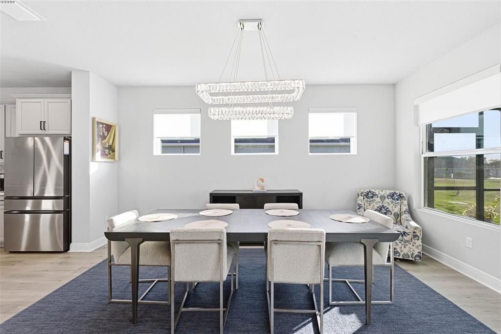 Chandelier, Dining room, Interior, Stainless Steel Appliances, Wood Texture Flooring