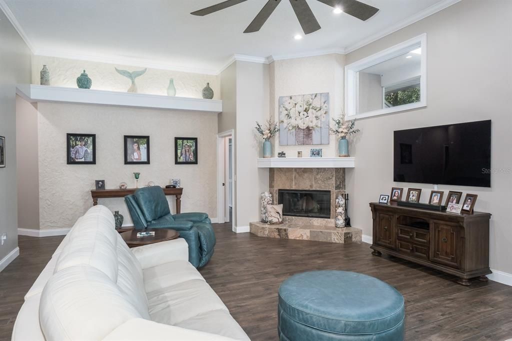 Fireplace, Interior, Living room, Recessed Lighting, Wood Texture Flooring